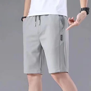 Новые летние мужские спортивные шорты, однотонные, с прямым рисунком, свободного типа, повседневные шорты с эластичной резинкой на талии, штаны для бега трусцой